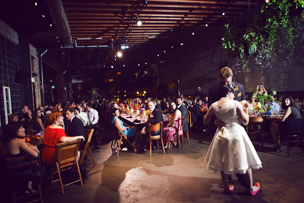 bride and groom share a first dance in a warehouse reception site - vintage LA wedding at The Smog Shoppe photo by top Orange County wedding photographer Duke Images